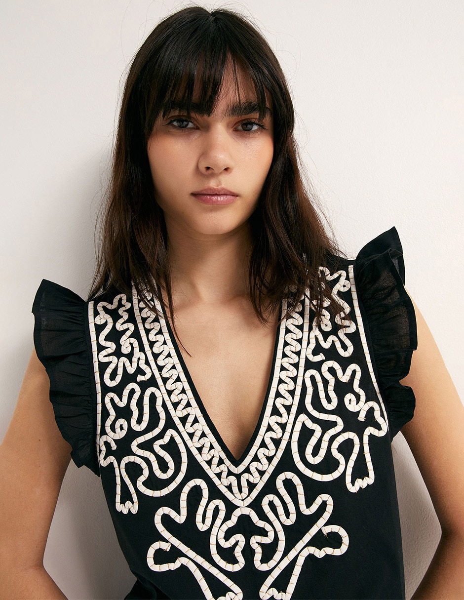 Blusa Sfera cuello V manga corta